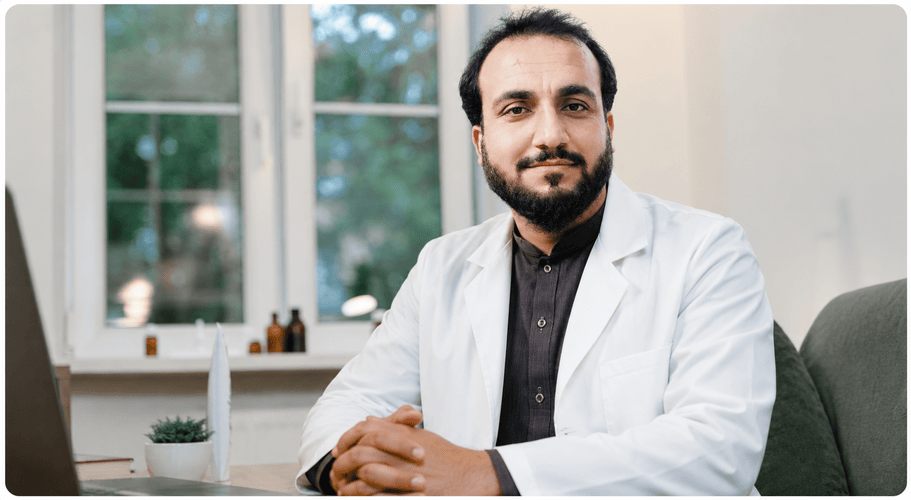 Doctor providing an online consultation through a laptop.